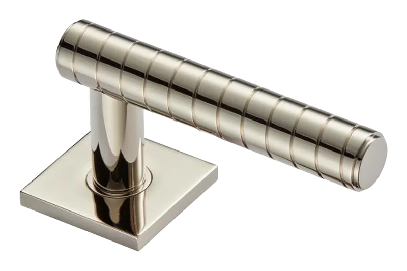 A reeded T-bar lever handle on a square rose, in a polished nickel finish